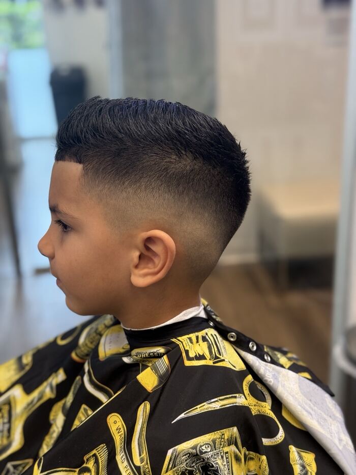 Kids' mid skin fade with a short brush-up top, Royal Palm Beach FL