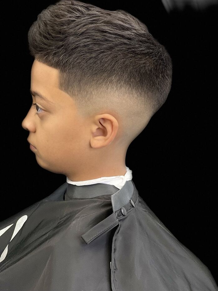 Kids' mid taper fade with a textured brush-up top, Royal Palm Beach FL