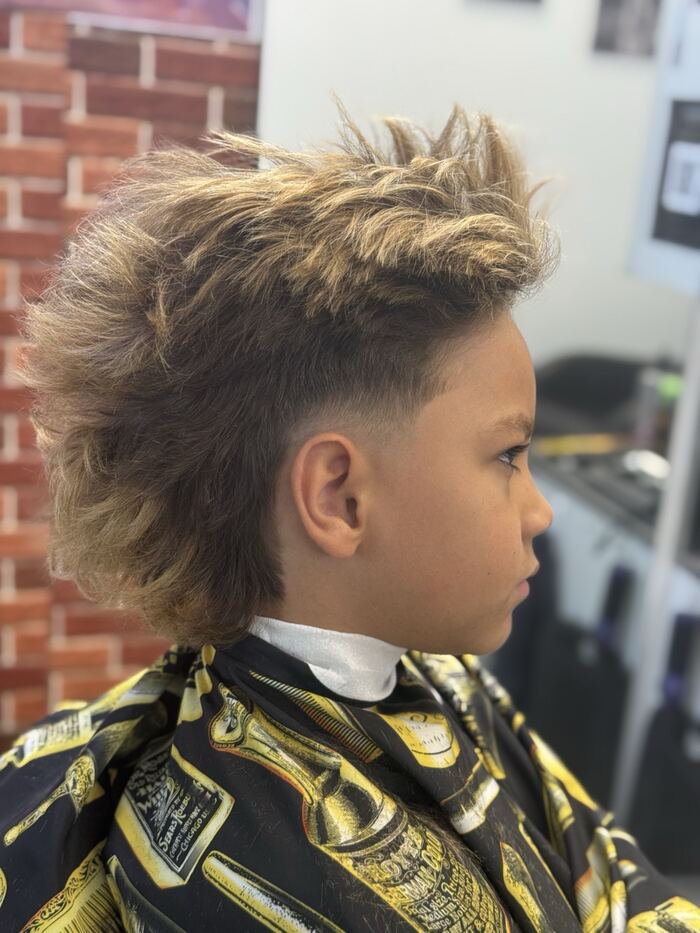 Kids' mullet with a burst fade and blonde highlights, Ricky's Style Barbershop, Royal Palm Beach